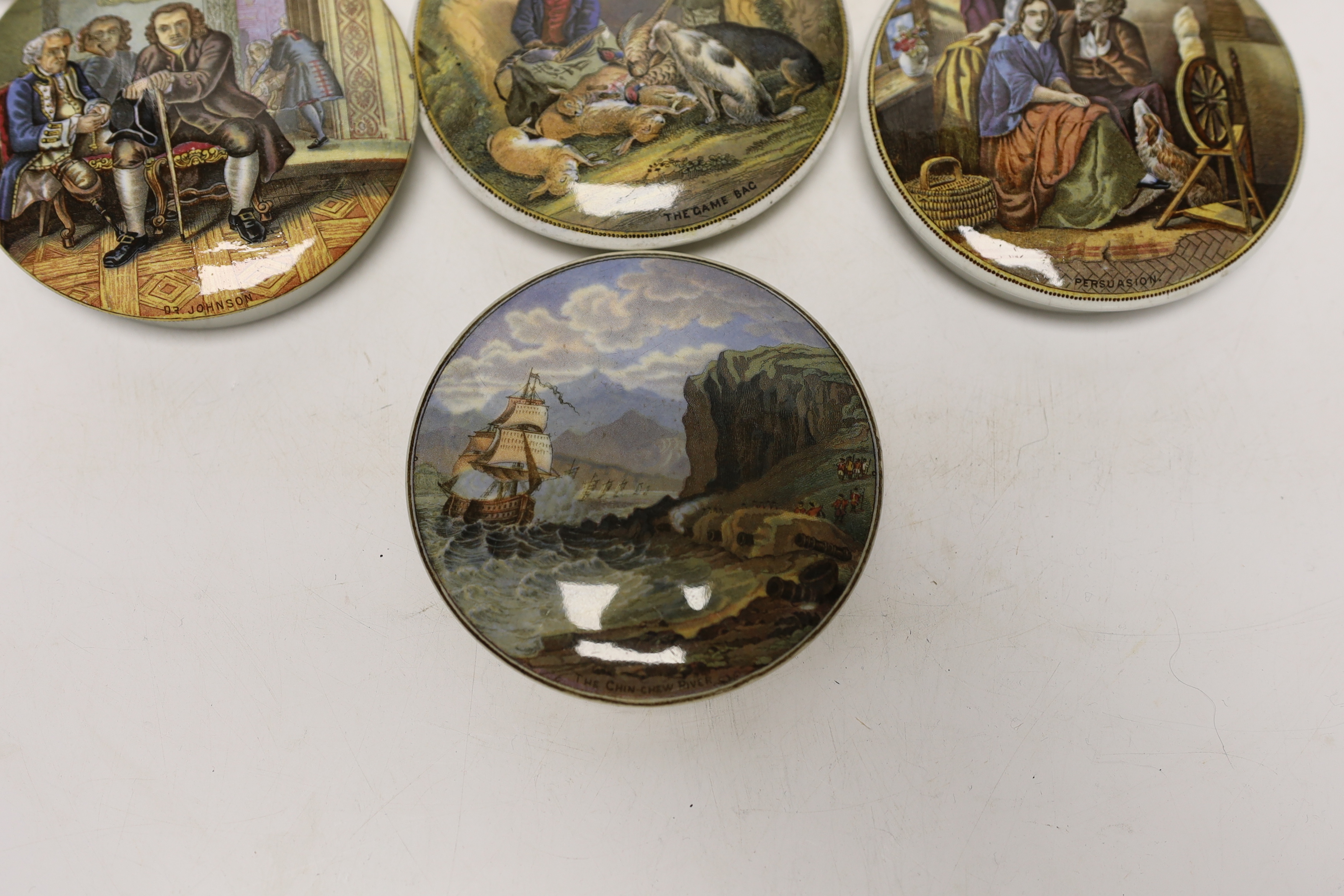 Eight Victorian ceramic Prattware pot lids